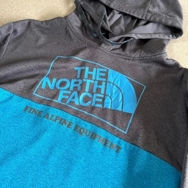 2435-44592384-0538-4e72-b60c-613ccb3b5af8-1785909809170-3464137.jpeg The North Face Men's Blue and Grey T-shirt