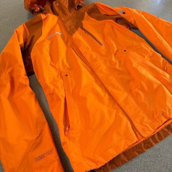2435-dc2b8e36-f52f-4094-a94a-ada40621d37a-1787464832408-555426440.jpeg Montbell Women's 2L GORE-TEX Performance Shell Jacket - Dark Orange/Yellow